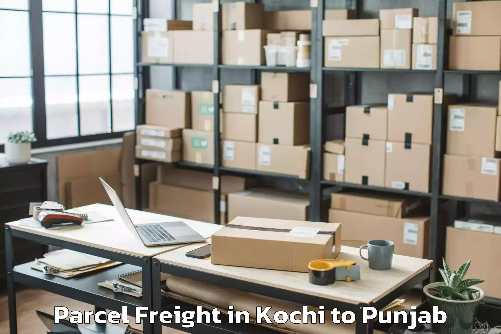 Book Kochi to Garhshankar Parcel Freight Online